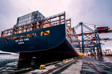 Logistics - Black Sail Ship on Body of Water