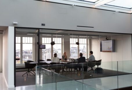 Business Meeting - people sitting on chair inside building